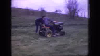 New Jersey USA (1966): Kids Running Around While Man Rides Lawnmower