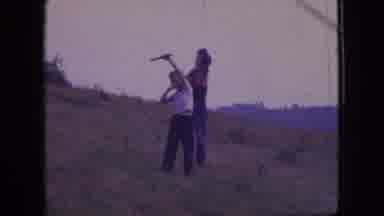 New Jersey USA (1966): Small Child Holding A Stick With His Friend In A Field