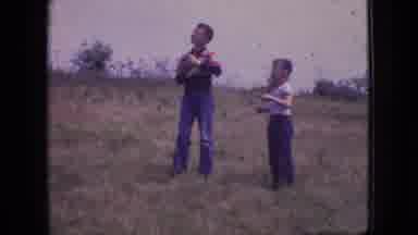 New Jersey USA (1966): A Little Boy Trying To Imitate This Brother