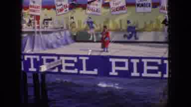 New Jersey USA (1966): Clowns On A Windy Steel Pier Entertaining An Audience On A