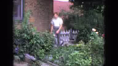 New Jersey USA (1966): Young Children Walking Through A Garden And Young Swimmer