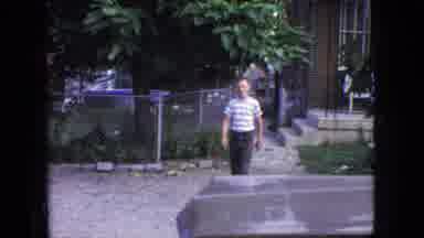 New Jersey USA (1966): Two Young Children Outside In The Garden On A Warm Sunny