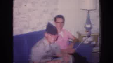 NEW JERSEY USA-1966: Teenagers In Living Room With Military Uniformed Friend