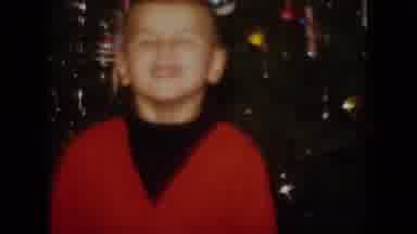 New Jersey USA (1966): A Classic Family Christmas With Young Boy Waving And