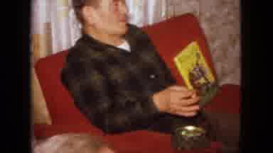 New Jersey USA (1966): Dad Smoking A Cigarette Boy Hides From Camera Bot In Red On