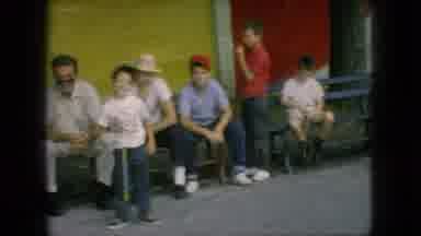 New Jersey USA (1966): Funny Family Gathered On Benches Smiling, Laughing, And