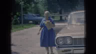 New Jersey USA (1966): People Get Out Of A Car In Front Of A House On A Summer Day