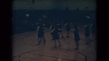 Ohio USA (1966): Girls Cheerleading Team Wearing Black Dresses Dancing By Gym Room