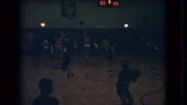 Ohio USA (1966): Cheerleaders Performing On Court While Basketball Players Warm Up
