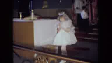 Ohio USA (1966): Young Girl In White Dress Walks Down Church Stairs