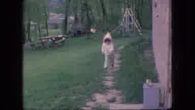 Ohio USA (1966): Young Toddler Running Happily Outside