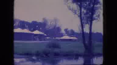 Ohio USA (1966): Water Lake Tree Leafs Mud Homes Grass Sky Roof Cement Bushes
