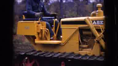 Ohio USA (1966): Young Man Driving A Heavy Tracked Machine