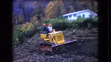 Ohio USA (1966): Two People Ride Heavy Equipment