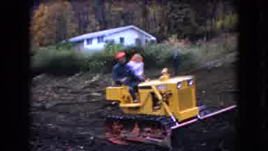 Ohio USA (1966): Old Men On A Tractor Plowing A Field