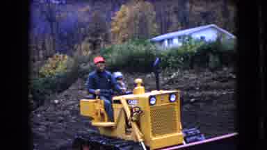 Ohio USA (1966): Man And Child Riding Farming Equipment