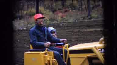 Ohio USA (1966): Farmer Glasses Child Hats Tractor Grading Dirt Hill Backwards