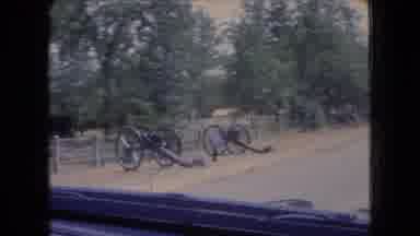 Ohio USA (1966): Driving Past Cannons Memorial With A Statue Of A Man Riding A