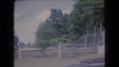 Ohio USA (1966): Car Driving Past Statue