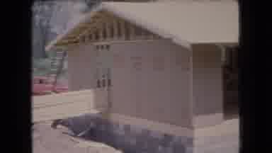 Ohio USA (1966): A House Under Construction While Men Hammering The Roof