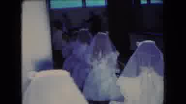 Ohio USA (1966): Bridal Party Of Seven Year Old Sitting On Wood Seats In A Theater