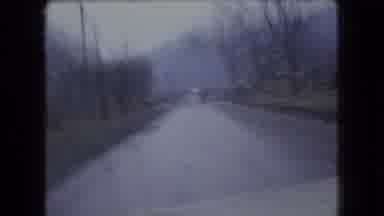 Ohio USA (1966): Footage Taken From Moving Car Following Behind A Wagon In A Small