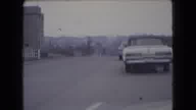 Ohio USA (1966): Classic Car Driving In A City Fallen Skier Near The Ski Lift