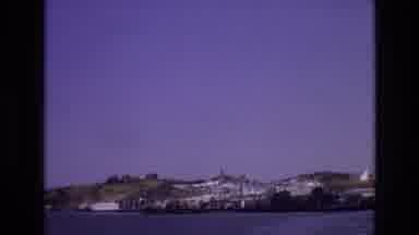 PORTUGAL-1972: Coastal Town View with Hasta La Vista Espana Title Card