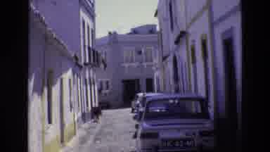 Portugal (1972): Tree Lined Street And Narrow Alleyway Of A Village