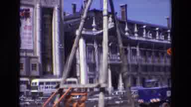 Portugal (1972): Cars Passing Big Buildings Flashing Yellow Light Construction And