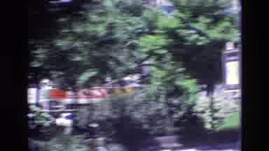 PORTUGAL-1972: Driving Down An Urban Road Passing By Cars