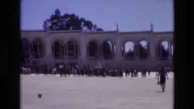 Portugal (1972): People Are Walking Towards The Multiple Arched Structure