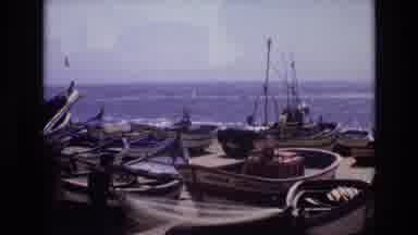 Portugal (1972): People Working On Boats On A Dock