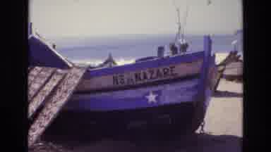 Portugal (1972): Woman Poses By The Boats On Shore