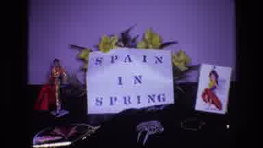 Spain (1972): Footage Of A Sign Reading Spain In Spring As Well As Footage Seen