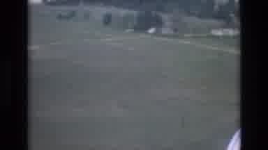 Spain (1972): View Looking Outside Window Of Aircraft Landing Followed By A Couple