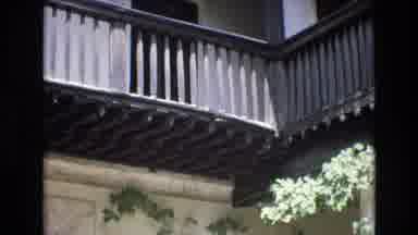 Spain (1972): People Explore Building And Balcony