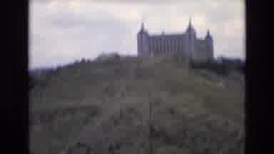 Spain (1972): A Scenic Drive To A Countryside Castle Through Rolling Hills