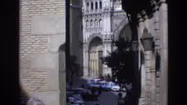 Spain (1972): People Walking On Street Near Cathedral