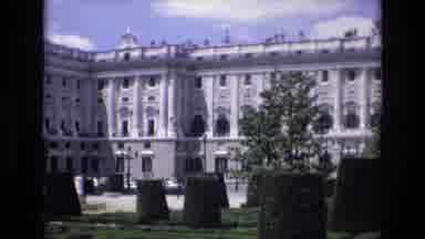 Spain (1972): Big Building Lots Of Windows Surrounded By Street And Bushes