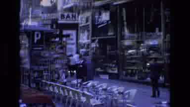 Spain (1972): View From Vehicle Of RoadCar Buses And Buildings In The City