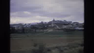 Spain (1972): On A Train Ride Through The Countryside A City Seen In The Distance