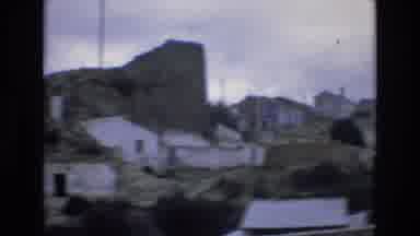 Spain (1972): Driving Through A Village