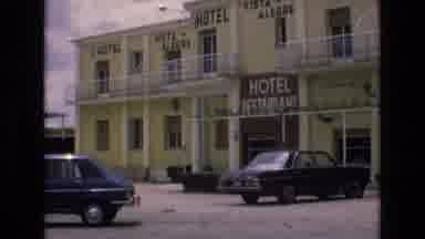 Spain (1972): Unusual Object On Hillside Switches To A Pale Yellow Hotel Exterior