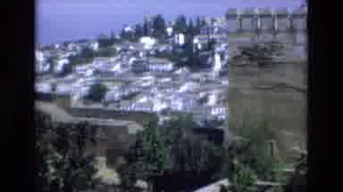 Spain (1972): View Of Houses On Mountainside Overlooking Stone Wall And Turret