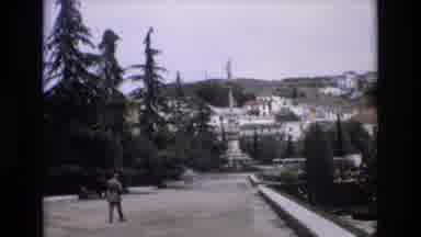 Spain (1972): Man In A Suit Walking Down An Empty Street In A Luxurious