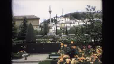 Spain (1972): A Historic Town With A Large Building And Garden