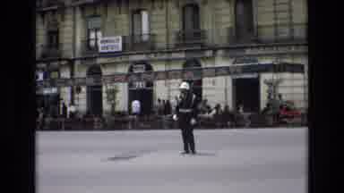 Spain (1972): A Police Officer Directing Traffic On A Downtown Intersection