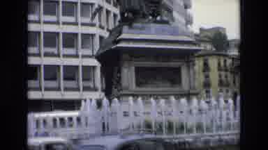 Spain (1972): Fountain Near Statue On Busy Street