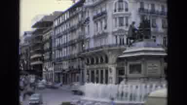 Spain (1972): Large White Building On Busy Street With Fountain